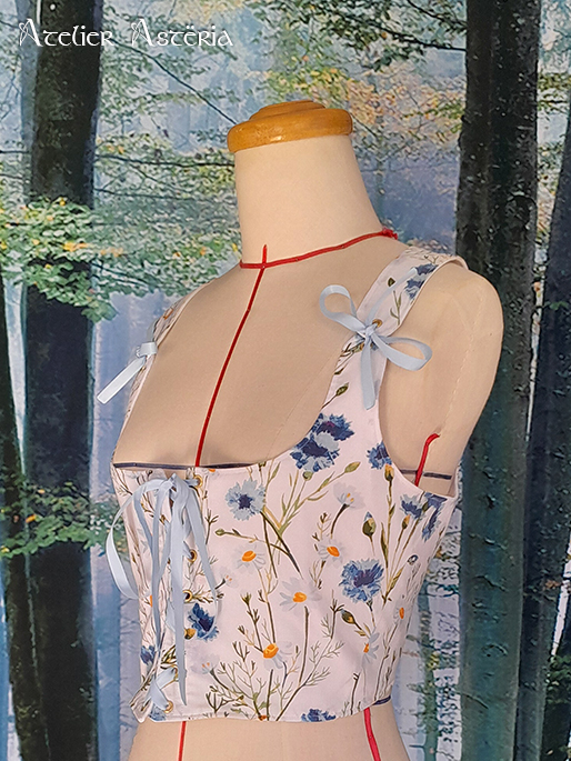 Flora : corselet lacé motif floral
